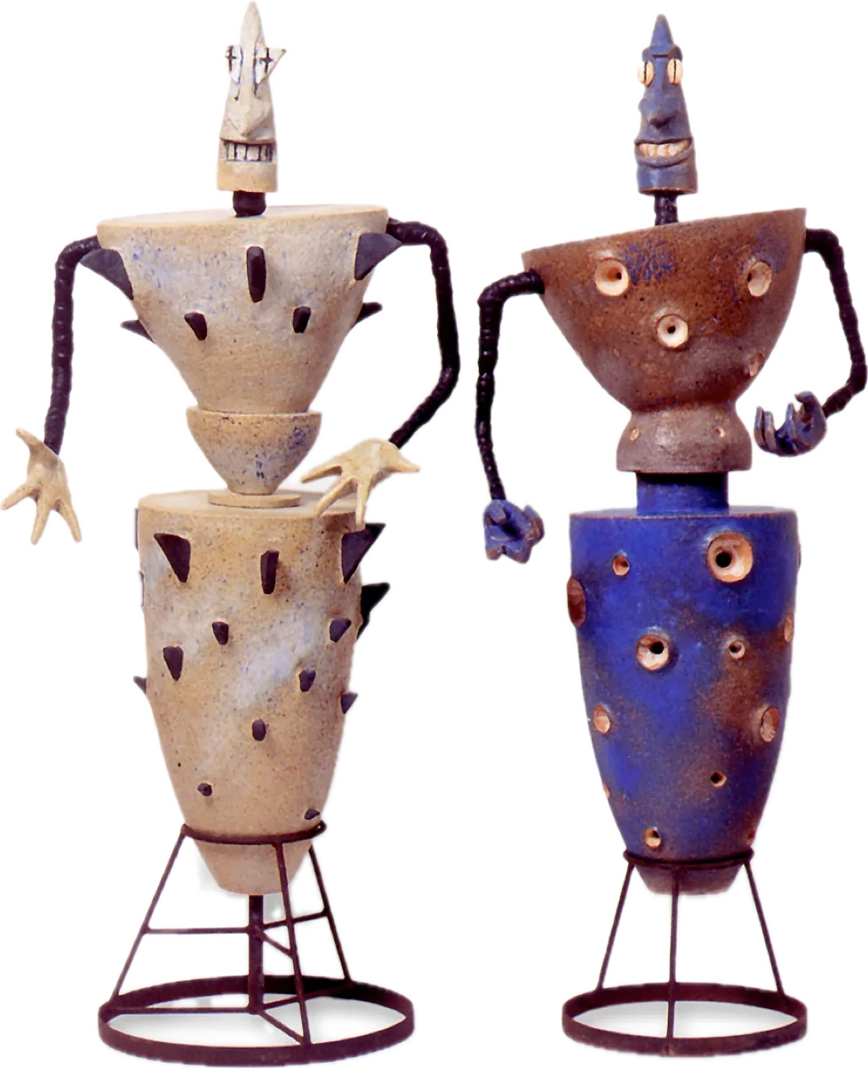 Biplo, dos figuras de gres sobre estructura de metal